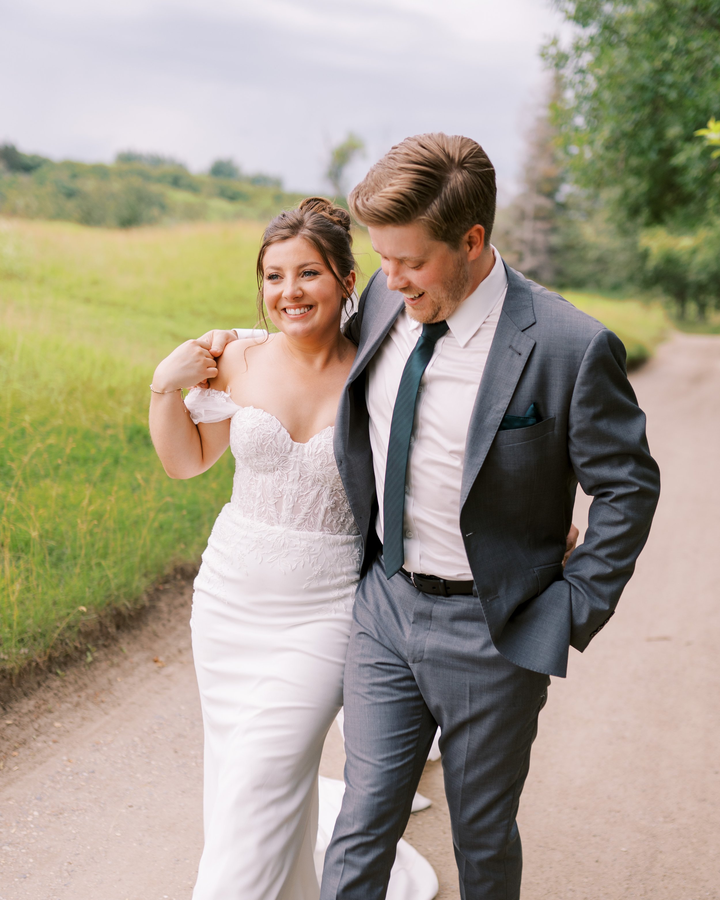 A bride and groom photographed by MJ&Co. on their wedding day
